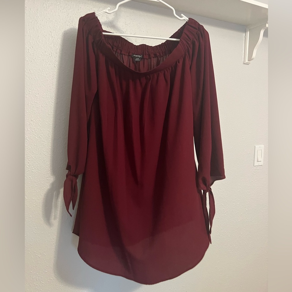Rhapsody Maroon dress with tie on the sleeve